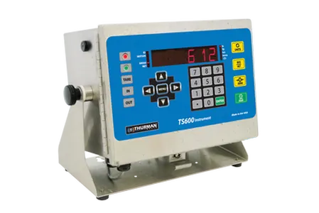 TS612 stainless steel NEMA 4X weighing indicator on its desk stand, red LED display and sealed keypad, wall-mount capable