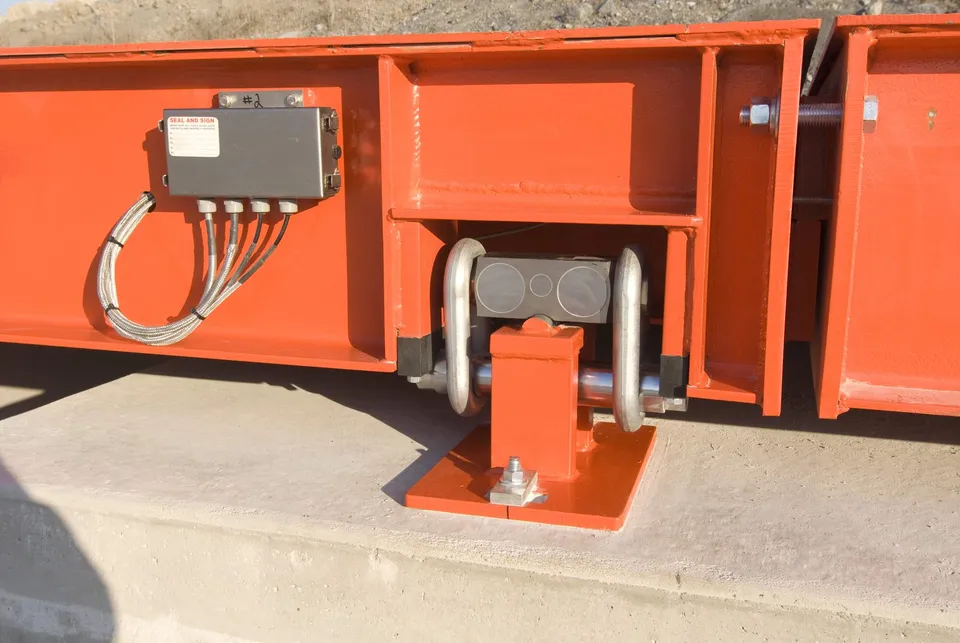Side of a Diamondback 8560XD: a load cell pocket beside its electronics enclosure on the weighbridge
