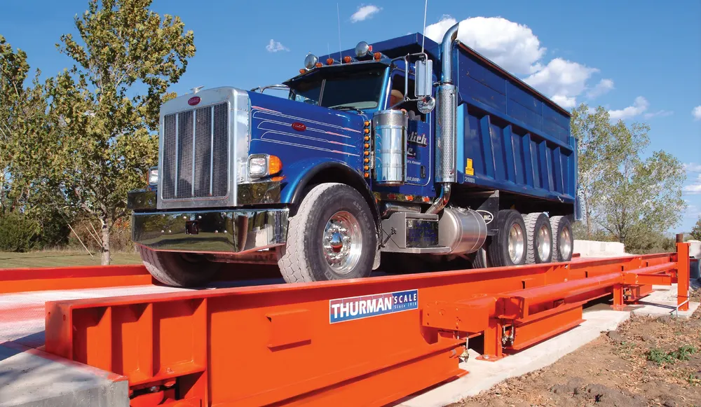 Loaded dump truck on a Thurman steel deck truck scale